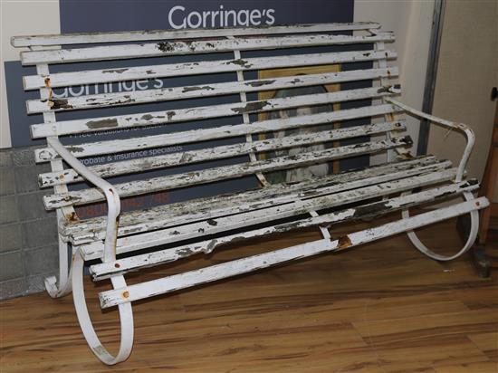A wrought iron bench W.180cm